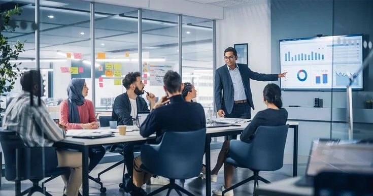 UltraGilt team reviewing portfolio performance